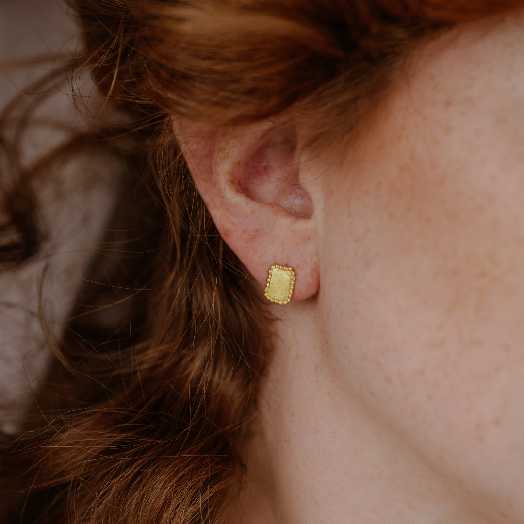 Each pair of these dainty studs is unique, showcasing individual granulation detailing and organic textures.