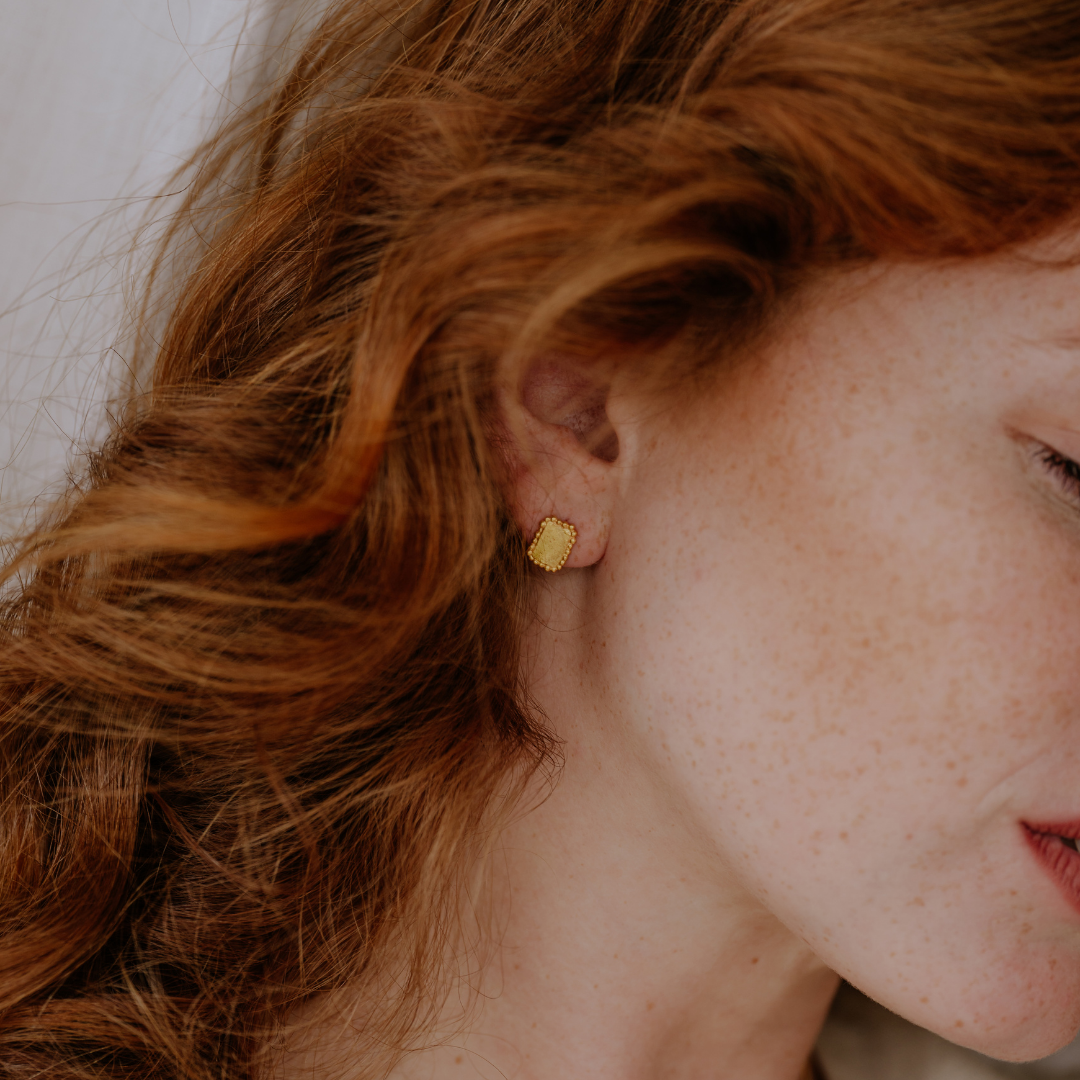 Handcrafted with care, these small rectangular stud earrings are easy to style for any occasion.