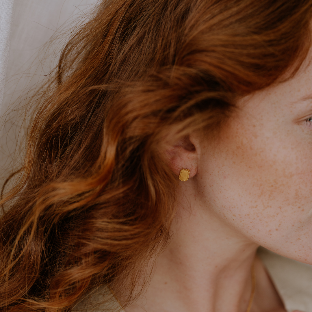 Elevate your everyday look with these small rectangular stud earrings, handcrafted in rich gold vermeil.
