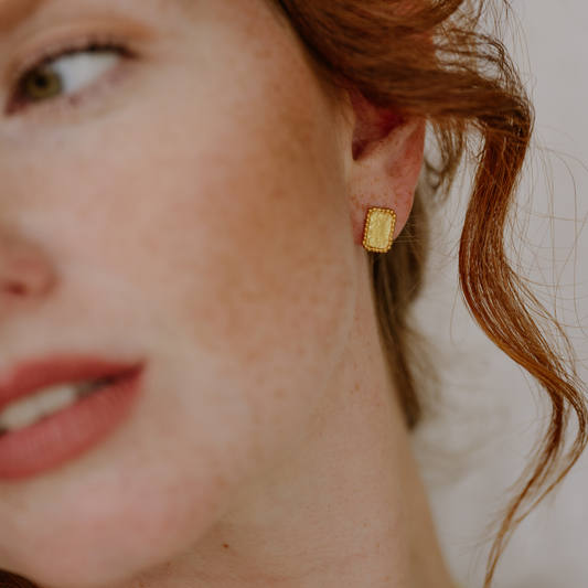 Dainty rectangular stud earrings crafted with precision in rich gold vermeil, featuring intricate granulation detailing.