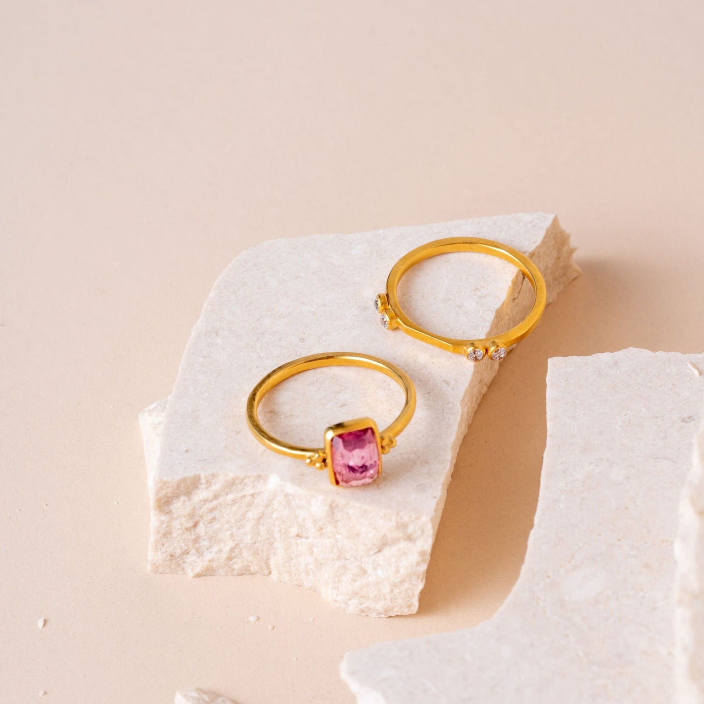 Handmade gold ring showcasing a delicate pink tourmaline and granulation accents