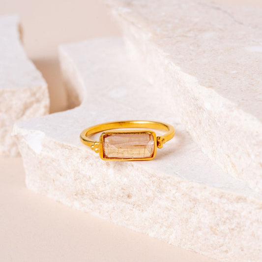 Unique rectangular tourmaline gold ring with intricate granulation detail.