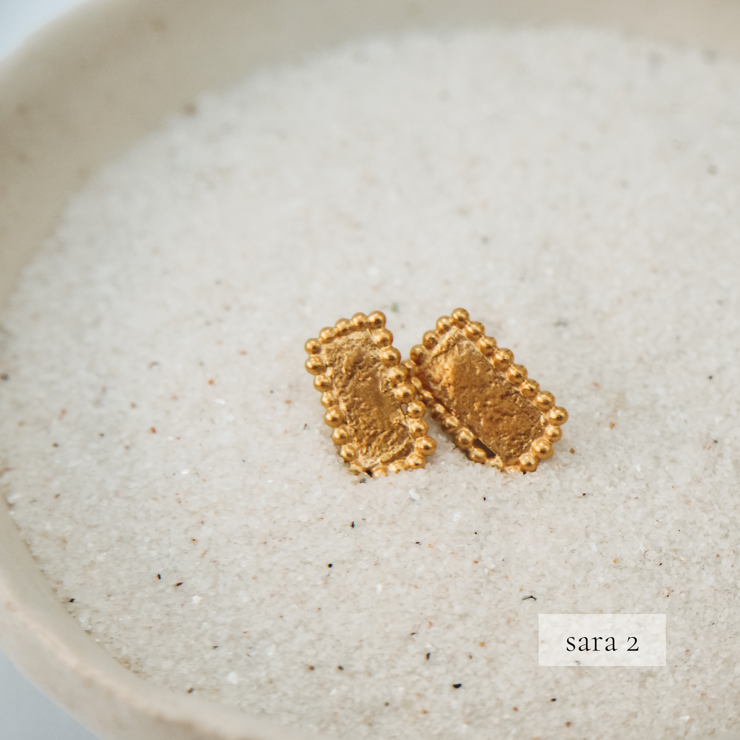 Handcrafted square gold earrings with granulated patterns